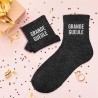 Chaussettes paillettes noires avec message "Grande Gueule" pour femmes