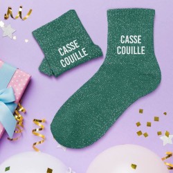 Chaussettes vertes à paillettes avec inscription "Casse couille"